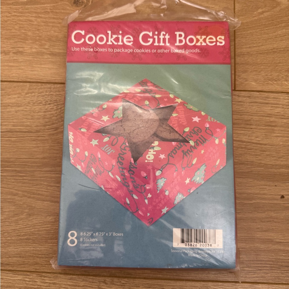 set of 8 seasonal cookie gift boxes with stickers for packaging baked goods.